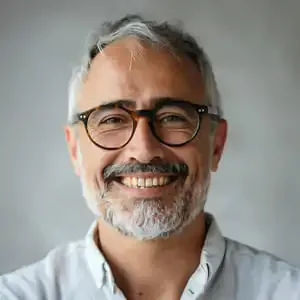 Happy middle-aged man experiencing relief using NerveCalm supplement